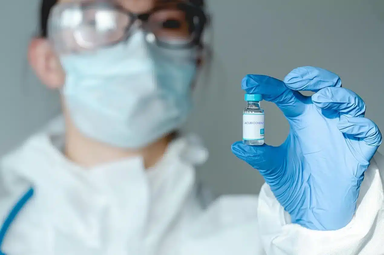 Research scientist preparing biochemical reagent